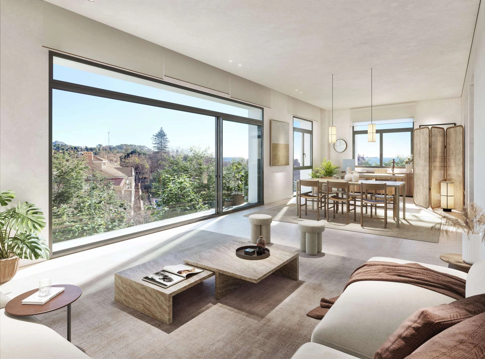 Große Fenster durchfluten die Wohnbereiche mit natürlichem Licht und verbinden die Innenräume mit der schönen Umgebung.