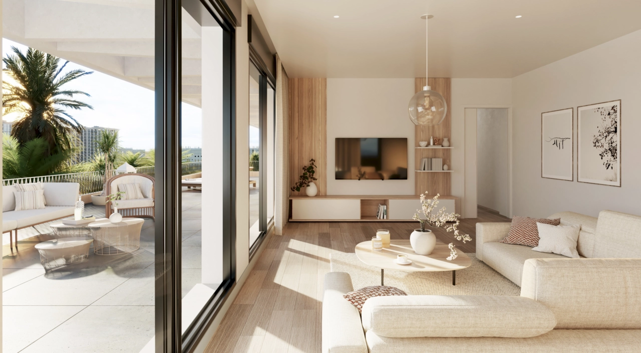 Ein helles, einladendes Wohnzimmer, das nahtlos mit einer großzügigen privaten Terrasse verbunden ist – perfekt, um das Klima der Costa del Sol zu genießen.