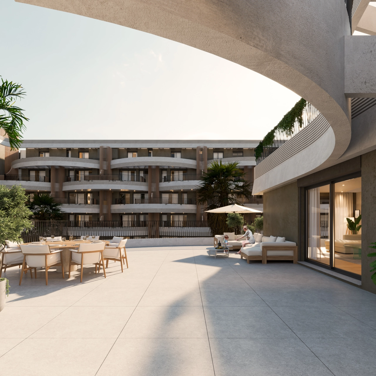 Eine weitläufige Terrasse, möbliert zum Essen und Entspannen, die einen privaten Rückzugsort im Freien bietet.