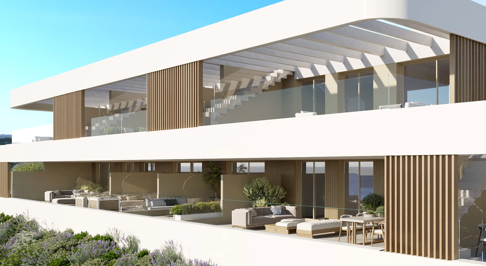 Die moderne Fassade präsentiert das klare Design und die geräumigen Terrassen dieser exklusiven Wohnungen in Estepona.