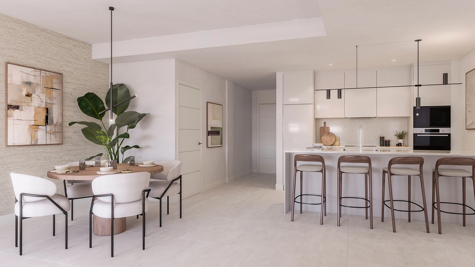 Ein offener Küchen- und Essbereich, voll ausgestattet mit hochwertigen Geräten für modernes Wohnen.