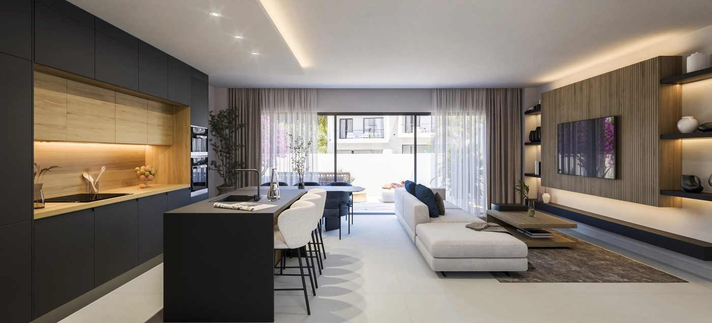 Der offene Wohnbereich kombiniert Küche, Ess- und Wohnbereiche für nahtloses, modernes Wohnen.