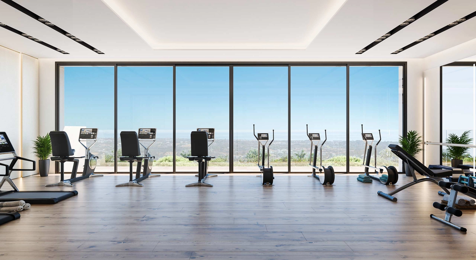 Ein hochmodernes Fitnessstudio mit Panoramafenstern, das Ihr Training zu einem landschaftlich reizvollen Erlebnis macht.