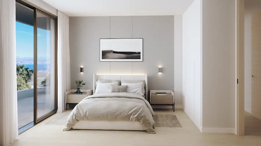 Ein zweites gut ausgestattetes Schlafzimmer, das Komfort, Stil und schöne Ausblicke bietet.