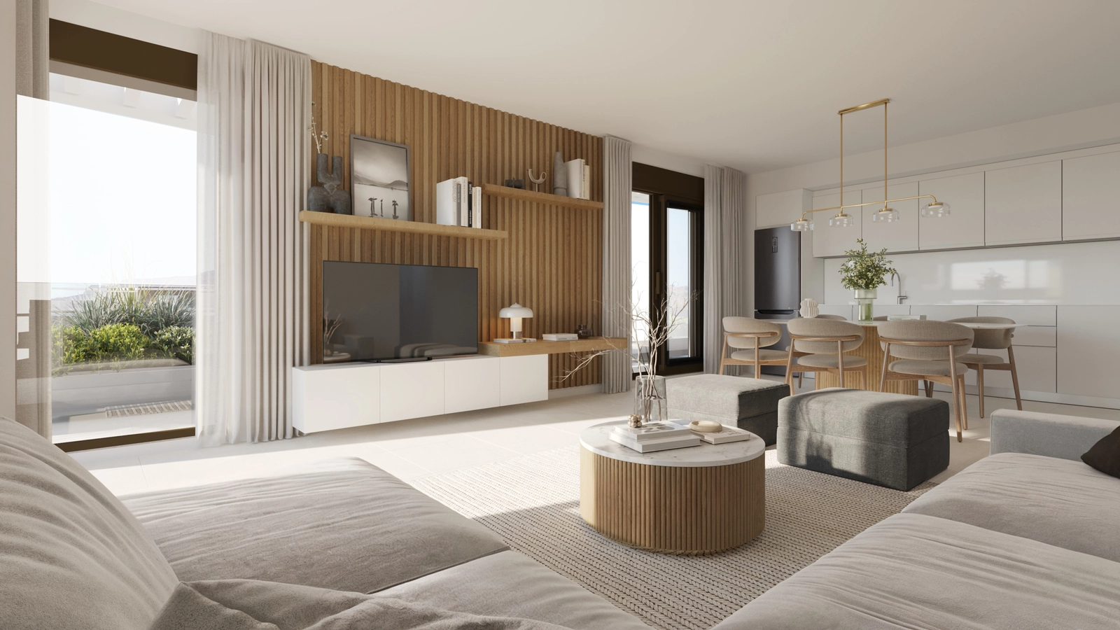 Ein Blick auf den modernen Wohnbereich, der die integrierte Küche und elegante Designdetails zeigt.