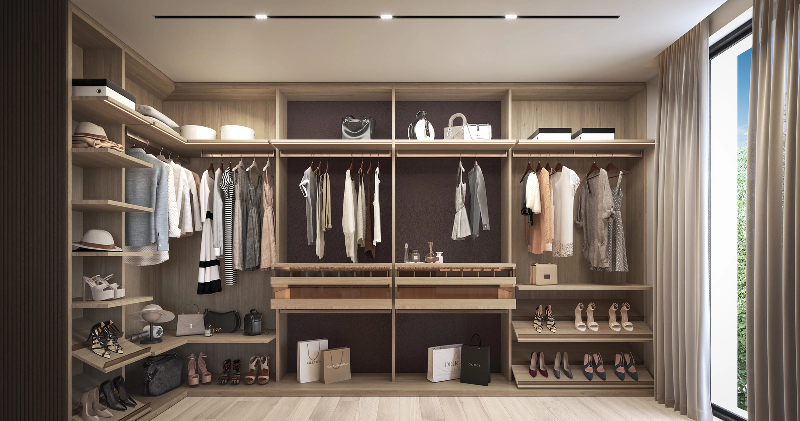 Ein geräumiger und wunderschön gestalteter begehbarer Kleiderschrank bietet viel Stauraum in einem eleganten Ambiente.