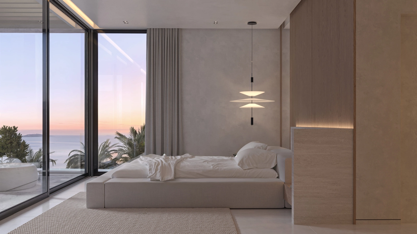 Ein ruhiges und stilvolles Schlafzimmer mit direktem Zugang zu einer privaten Terrasse durch große Glastüren.