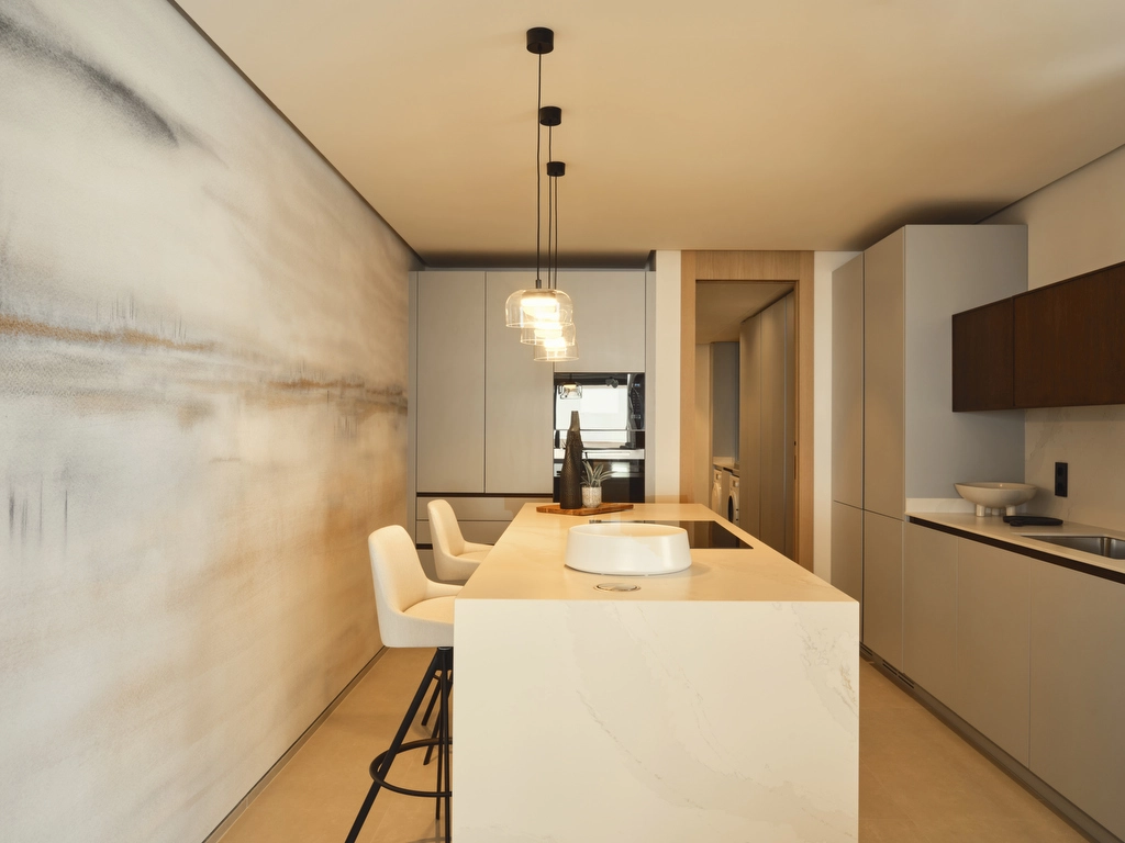 Eine hochmoderne Küche mit hochwertigen Geräten und minimalistischem Design, perfekt für den Alltag und zur Bewirtung von Gästen.