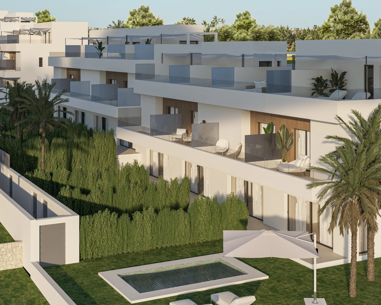 Eine Luftaufnahme der Anlage, die die moderne Architektur und die privaten Gärten zeigt.