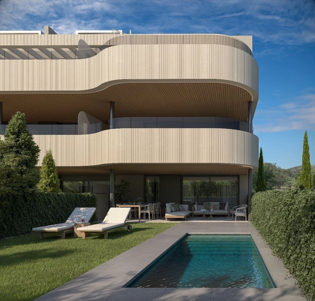 Eine Erdgeschosswohnung mit privatem Garten und eigenem Schwimmbad, die Privatsphäre und direkten Zugang ins Freie bietet.