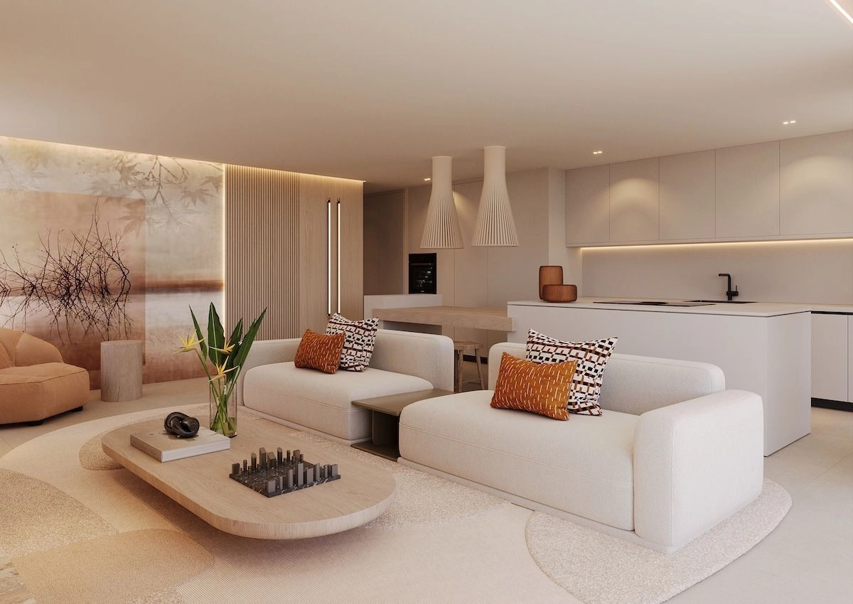 Eine elegante, moderne Küche, ausgestattet mit hochwertigen Geräten, nahtlos in den Wohn- und Essbereich integriert.