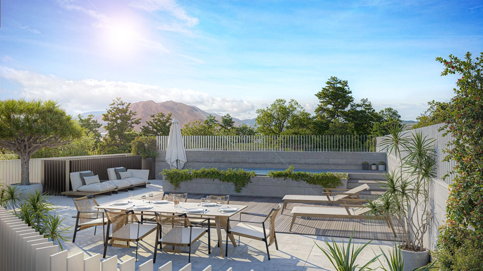 Die Dachterrassen bieten einen perfekten privaten Bereich zum Entspannen und Unterhalten, mit atemberaubendem Berg- und Meerblick.