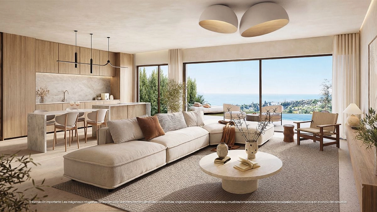 Küche und Wohnzimmer öffnen sich direkt auf die Terrasse und schaffen so ein perfektes Ambiente für ein Leben im Innen- und Außenbereich.