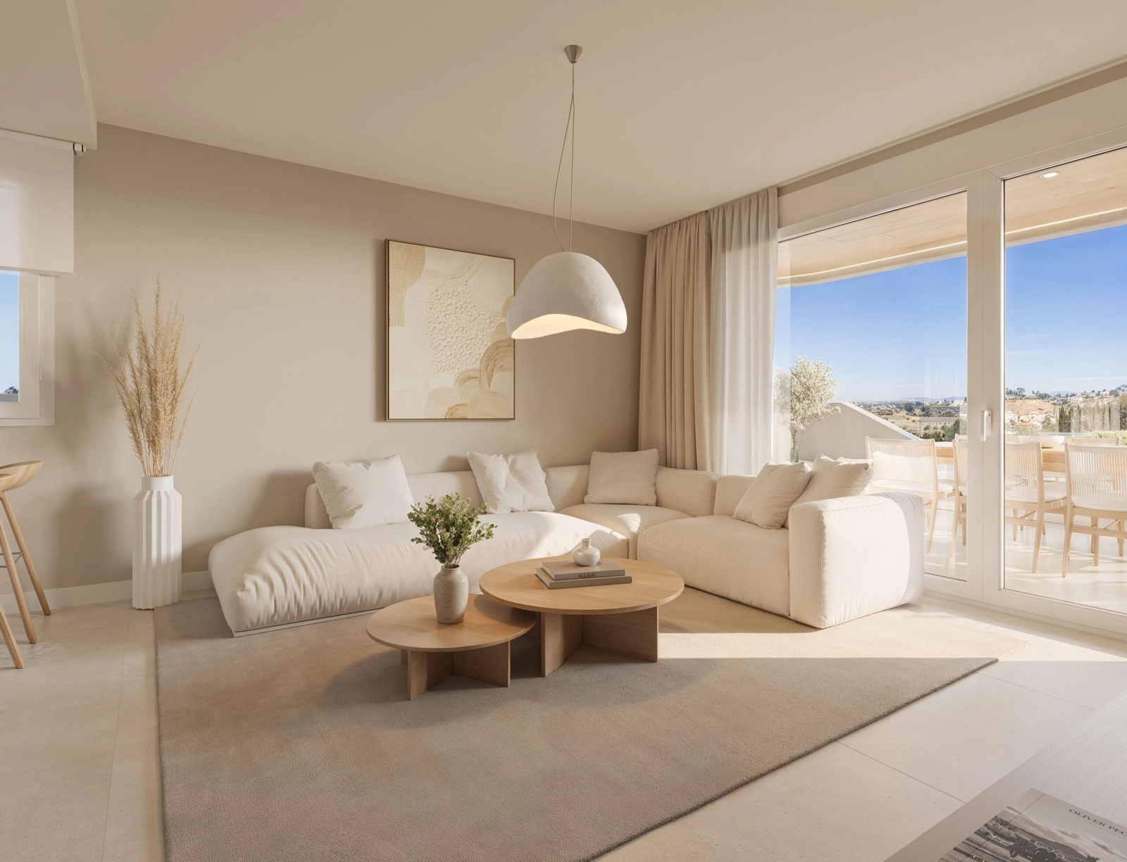 Das Wohnzimmer ist lichtdurchflutet und schafft eine helle und einladende Atmosphäre.