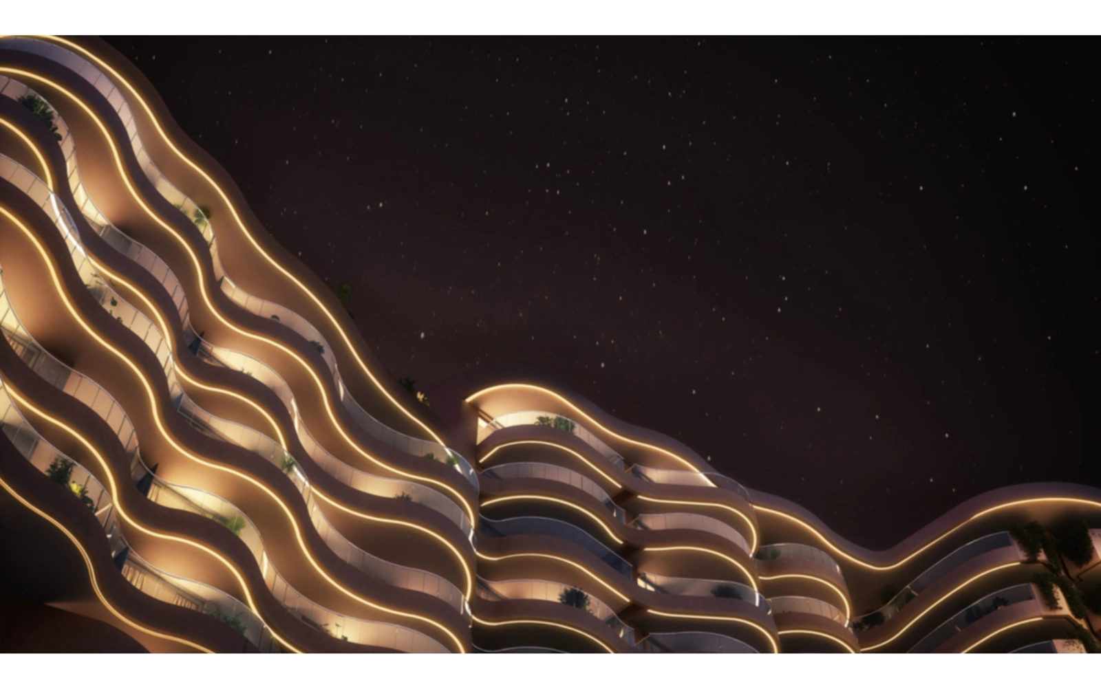 Die markante wellenförmige Architektur des Gebäudes ist nachts wunderschön beleuchtet.