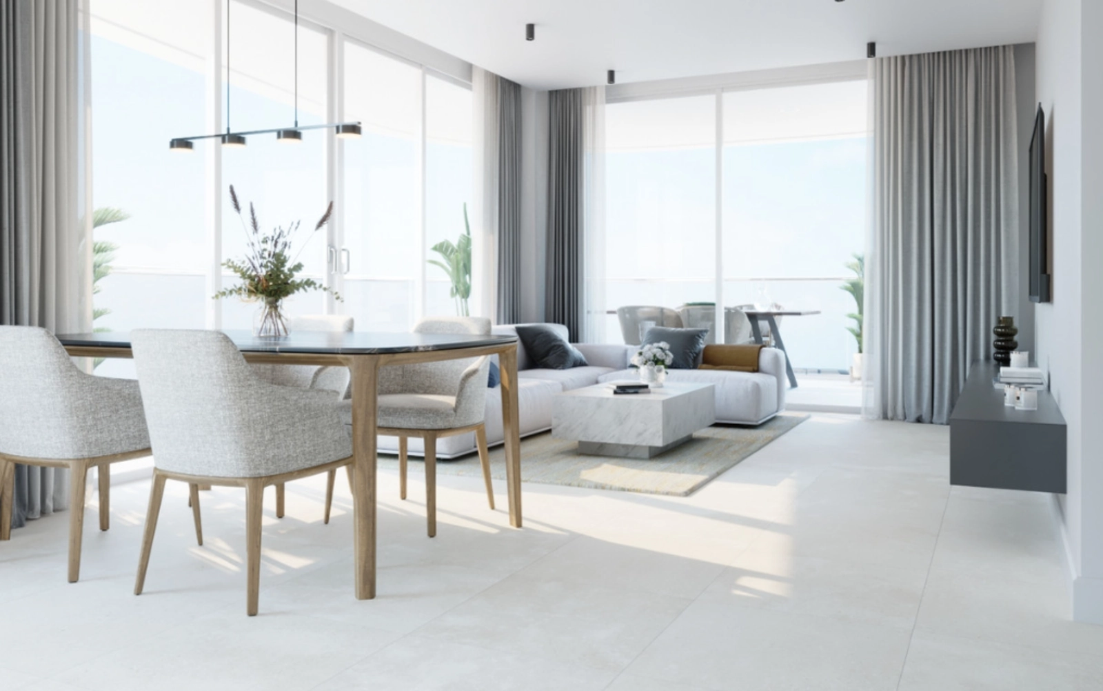 Ein geräumiges und helles Wohn- und Esszimmer, konzipiert für Komfort und Eleganz.