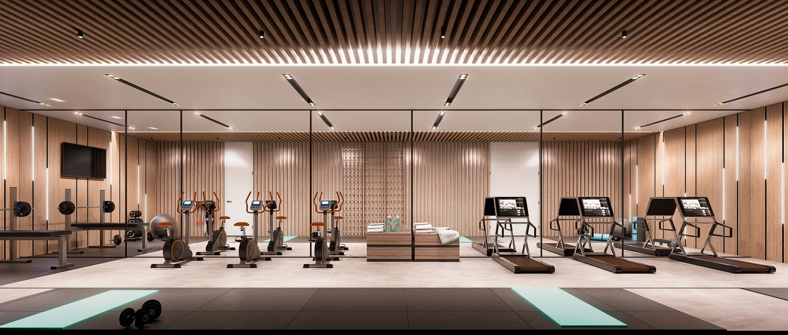 Ein hochmodernes Fitnesscenter, ausgestattet mit einer kompletten Palette moderner Trainingsgeräte für ein umfassendes Training.