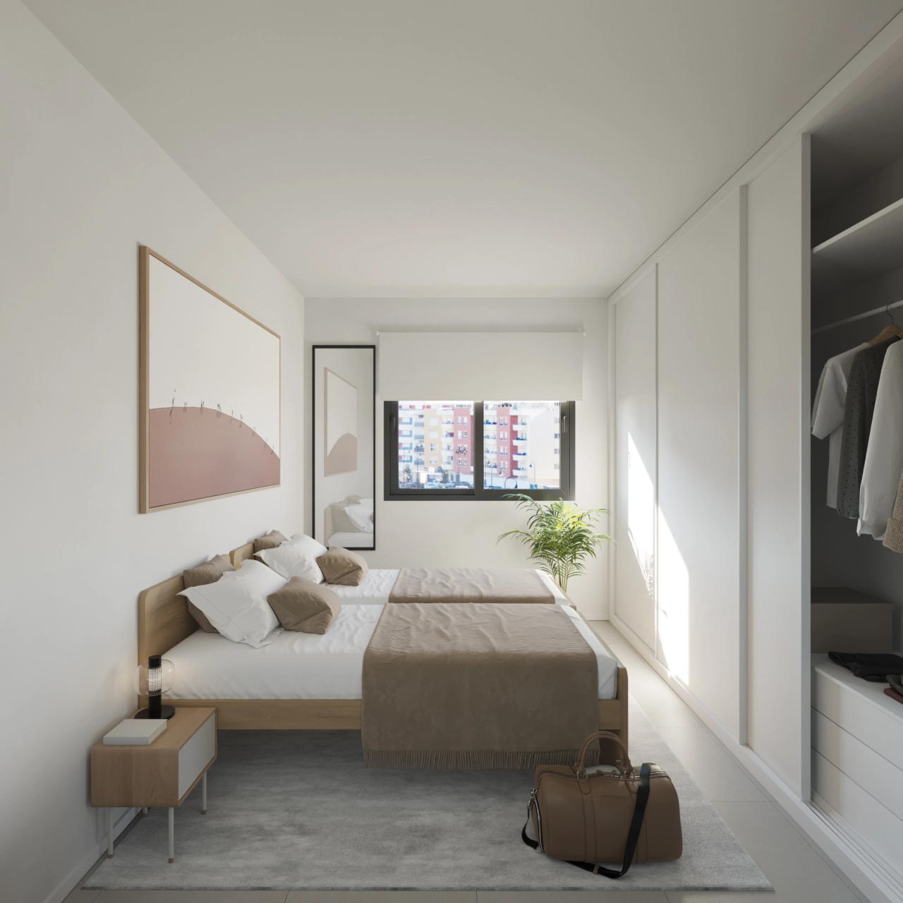 Ein komfortables und helles zweites Schlafzimmer mit viel Stauraum.