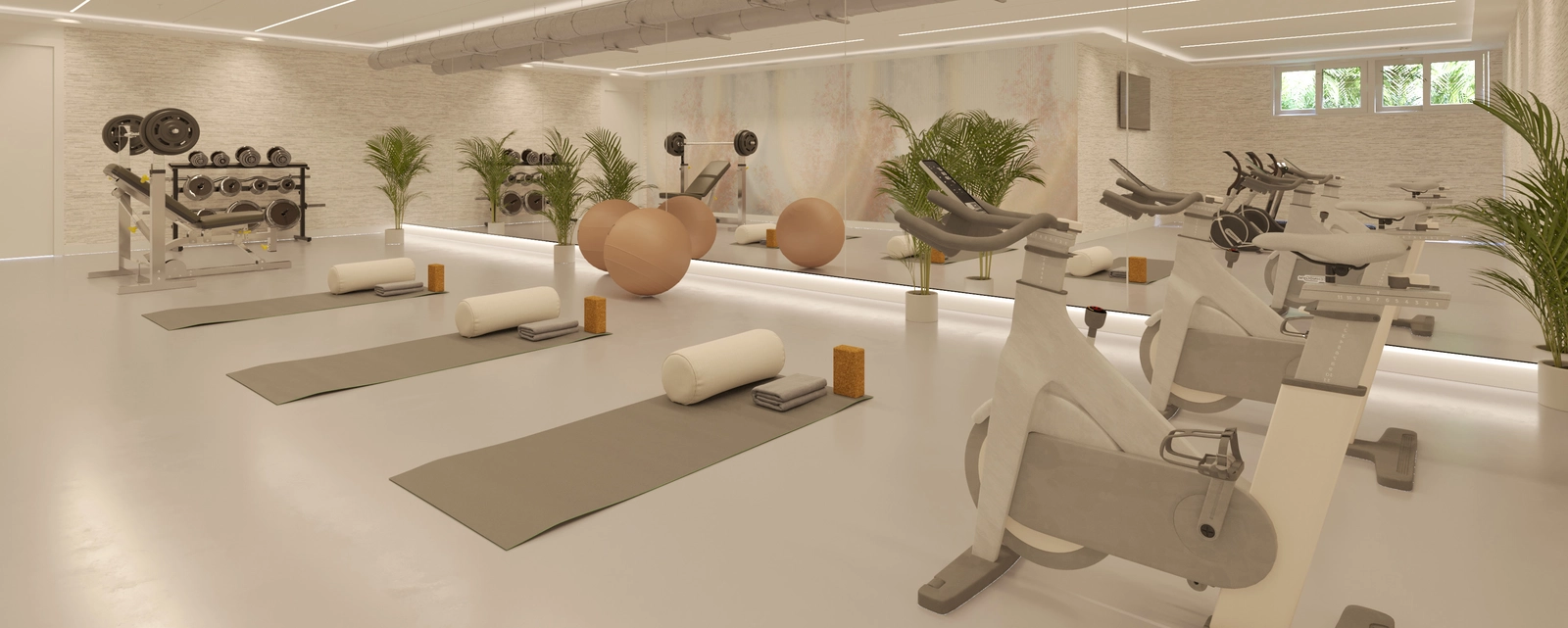 Ein voll ausgestatteter Fitnessraum ermöglicht den Bewohnern einen gesunden Lebensstil, ohne das Haus verlassen zu müssen.