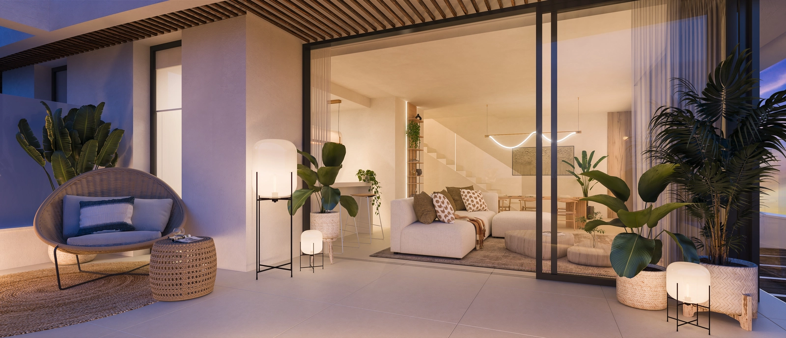 Ein eleganter Wohnbereich, der sich zu einer großzügigen Terrasse hin öffnet und nahtloses Wohnen im Innen- und Außenbereich ermöglicht.