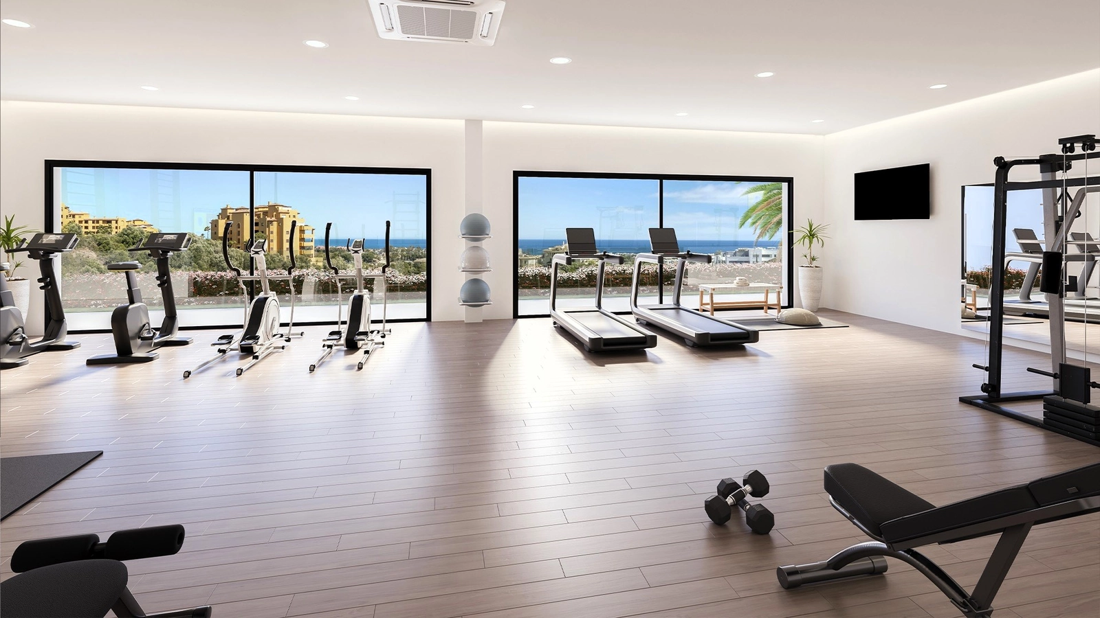 Das hochmoderne Fitnessstudio ist voll ausgestattet und bietet eine inspirierende Aussicht auf das Meer, um Ihr Training zu verbessern.