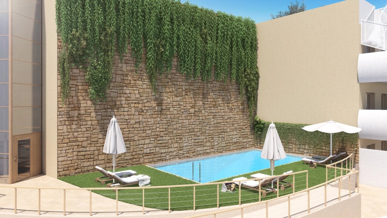 Einer der beiden einladenden Außen-Schwimmbäder, eingebettet in wunderschön angelegte Gemeinschaftsgärten.