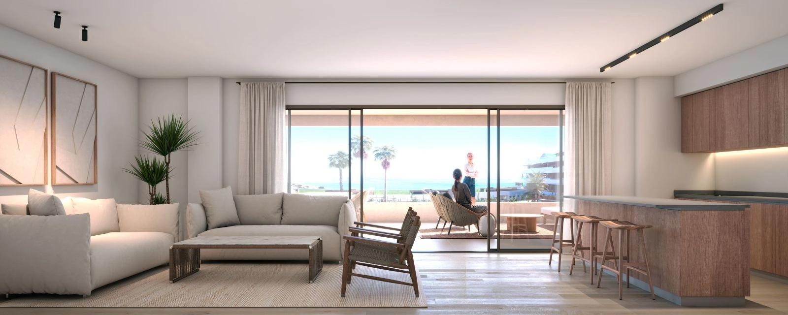 Ein helles und elegantes Wohnzimmer, das sich direkt auf eine private Terrasse mit Meerblick öffnet.