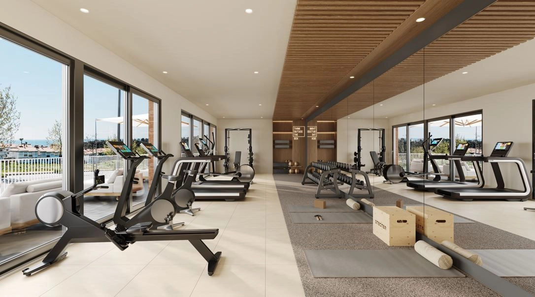 Ein hochmodernes Fitnessstudio mit modernen Geräten, um einen gesunden und aktiven Lebensstil zu unterstützen.