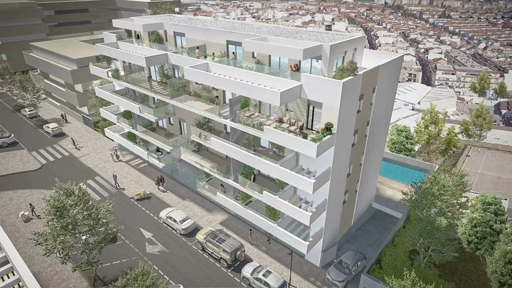 Ein Überblick über die Anlage, die ihre moderne Architektur und den Gemeinschaftspoolbereich hervorhebt.