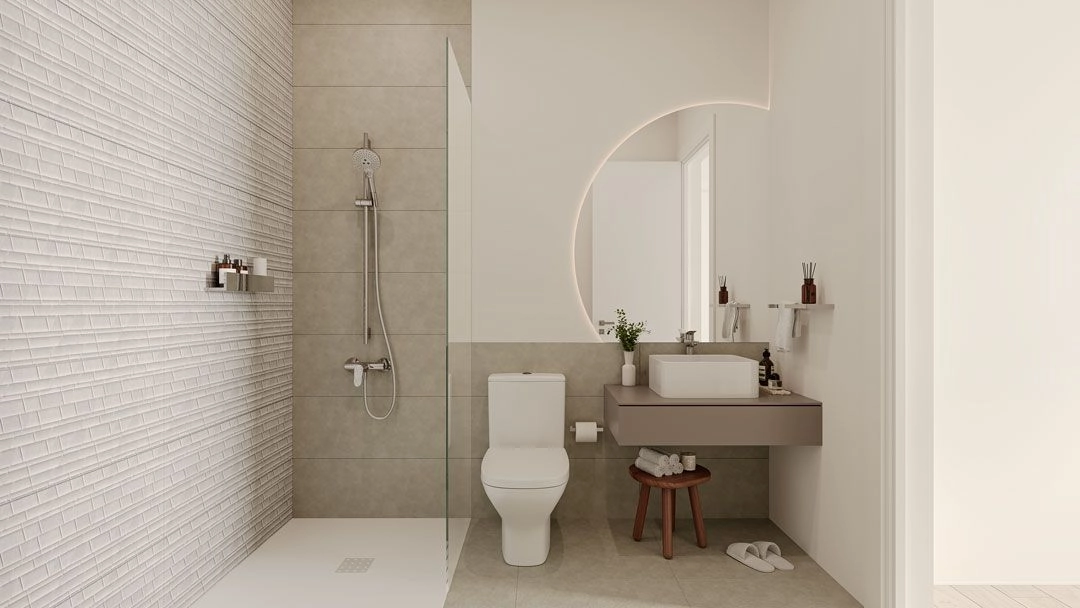 Ein elegantes Badezimmer mit moderner Ausstattung und hochwertigen Materialien für ein Spa-ähnliches Gefühl.