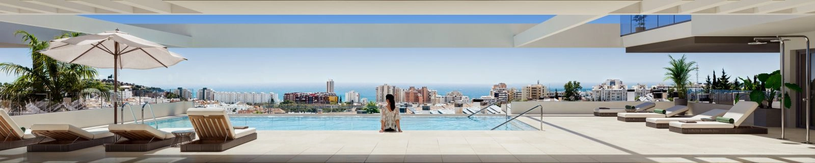 Der Infinity-Pool auf dem Dach bietet eine perfekte Umgebung zum Entspannen und Genießen des Panorama-Meerblicks.