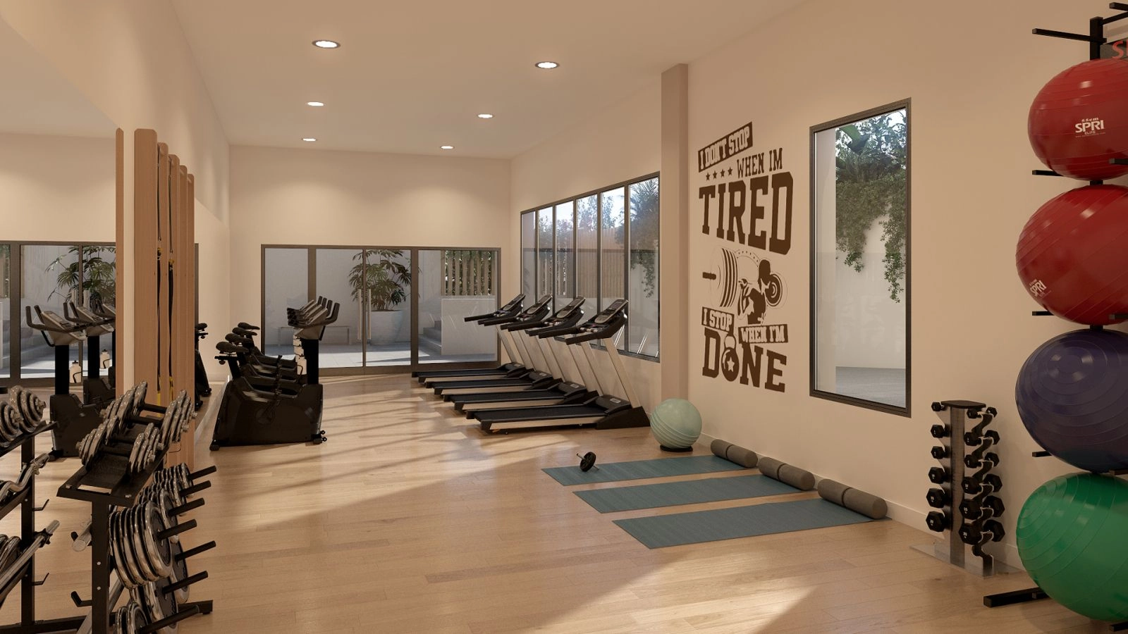 Das hochmoderne Fitnesscenter, komplett ausgestattet, damit Bewohner einen aktiven und gesunden Lebensstil pflegen können.