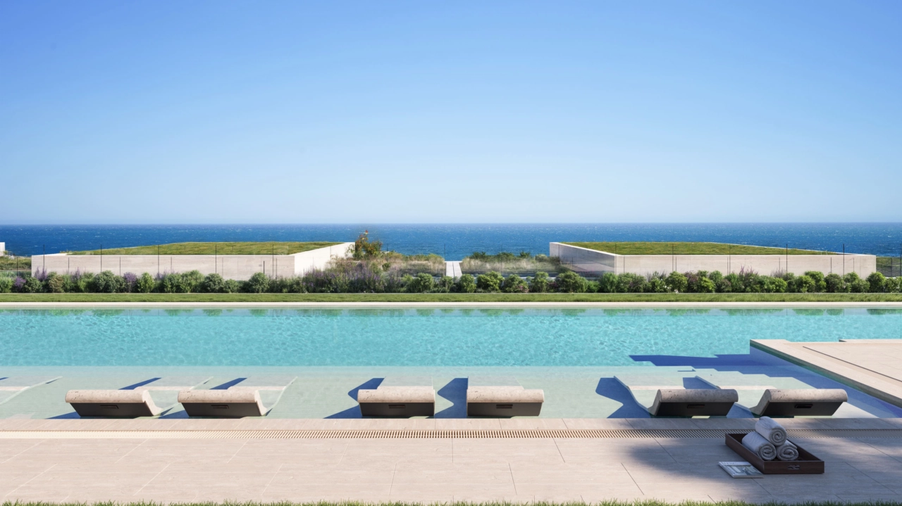 Der atemberaubende Gemeinschaftspool bietet einen Infinity-Rand, der mit dem mediterranen Horizont verschmilzt.