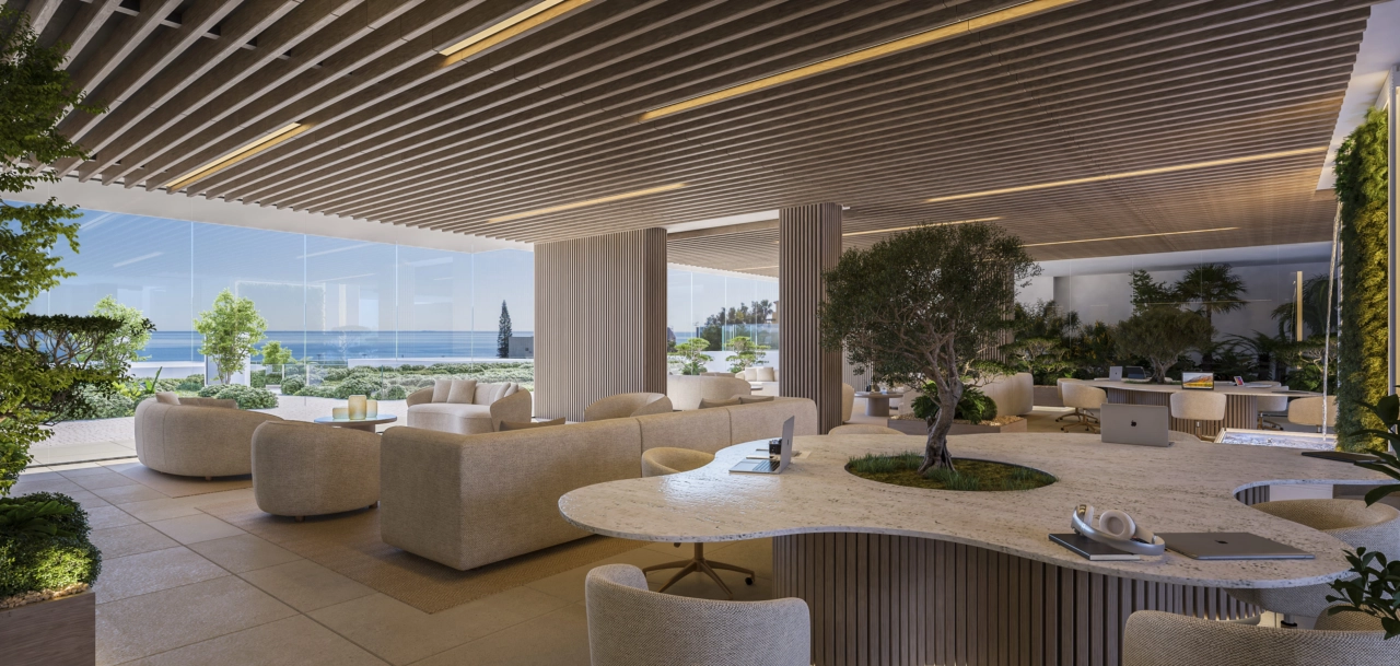 Eine anspruchsvolle Lounge und ein Co-Working-Bereich für Bewohner, elegant gestaltet zum Arbeiten oder Entspannen.