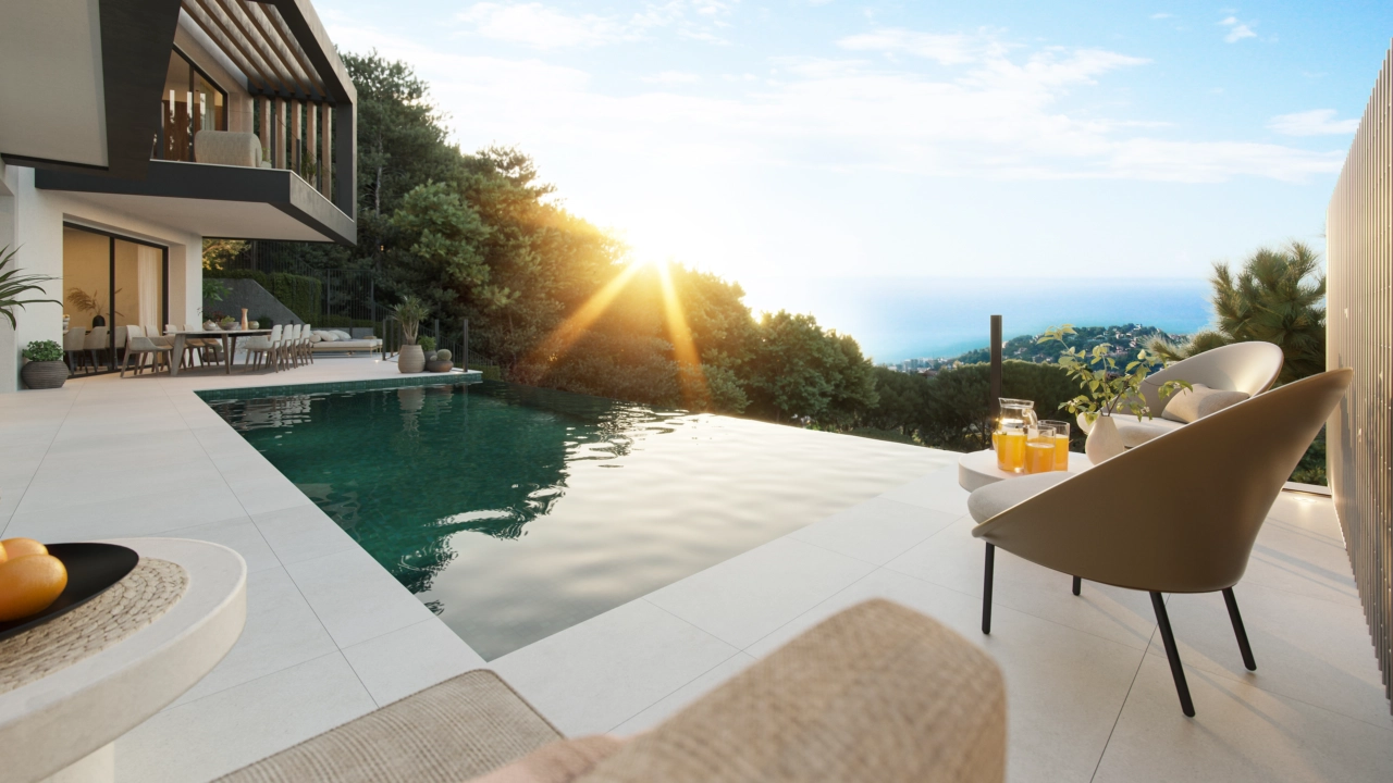 Entspannen Sie am Pool und beobachten Sie den Sonnenuntergang über den wunderschönen Hügeln Málagas.