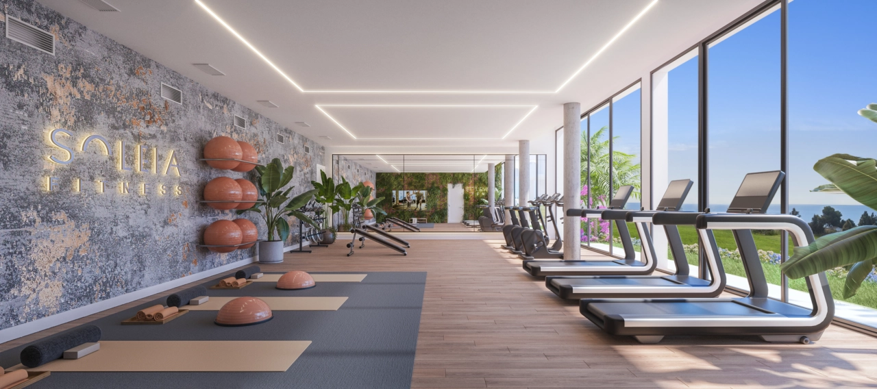 Bleiben Sie aktiv im voll ausgestatteten, hochmodernen Fitnesscenter mit inspirierendem Ausblick.