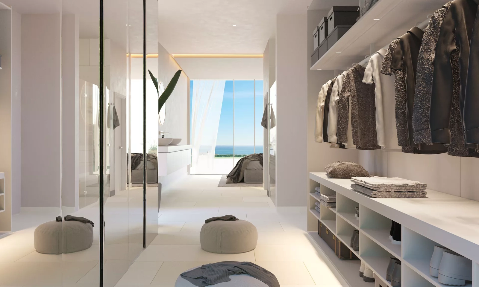 Ein geräumiges und gut gestaltetes Ankleidezimmer bietet reichlich Stauraum und einen Hauch von alltäglichem Luxus.