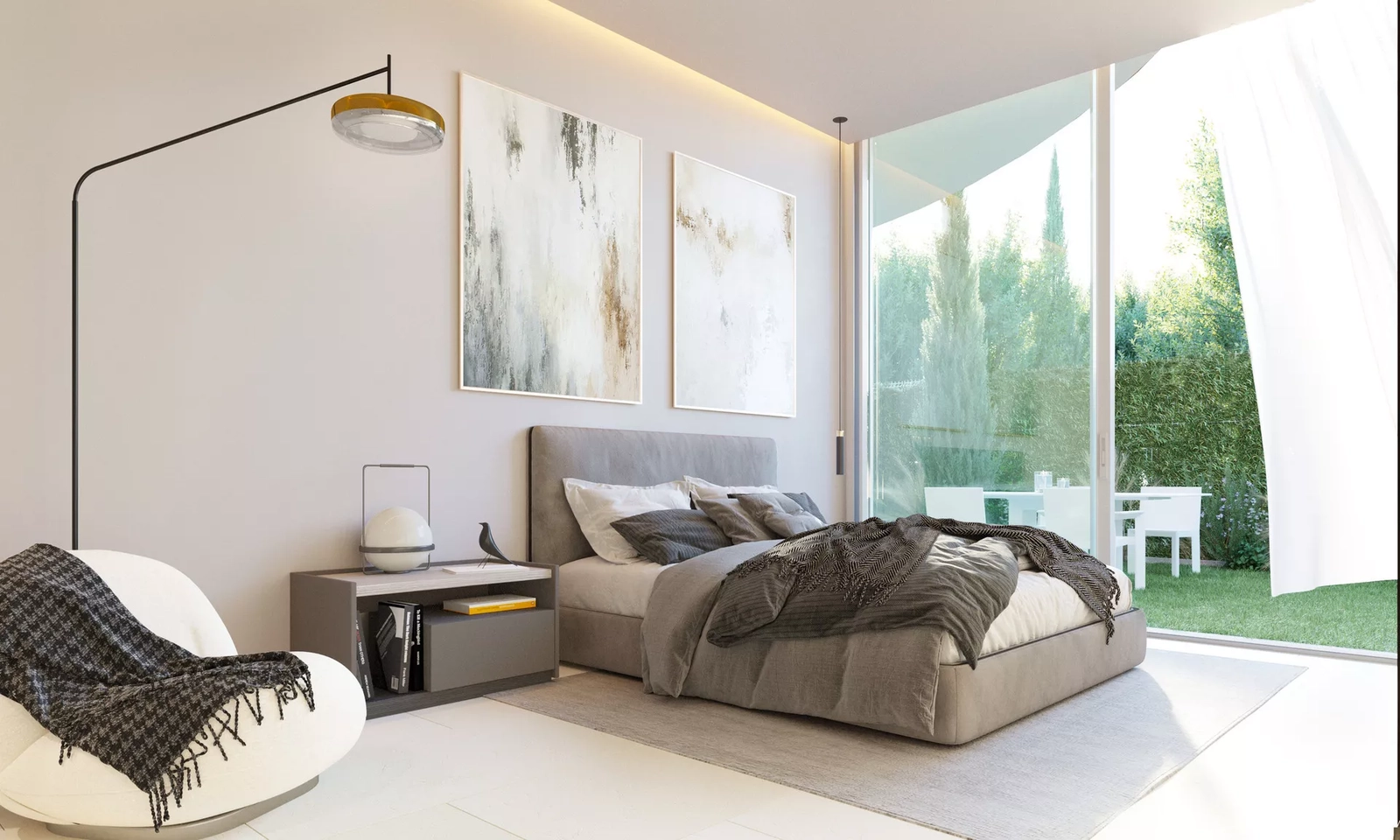 Ein komfortables Schlafzimmer mit großen Glasschiebetüren, die sich direkt zum mediterranen Garten öffnen.