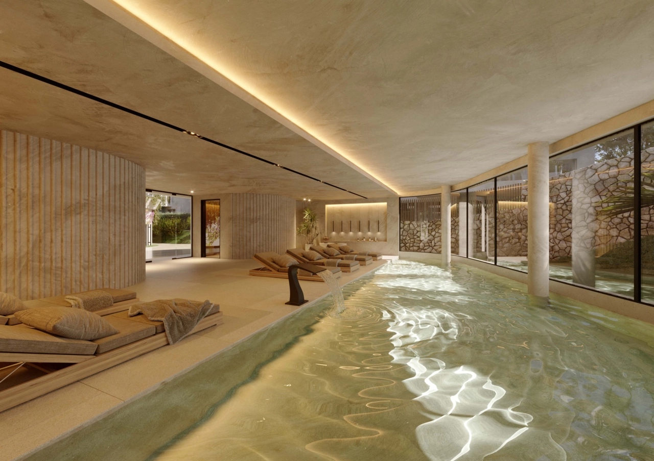 Der Innen-Spa-Bereich verfügt über einen beheizten Pool und Entspannungsliegen und bietet den Bewohnern einen friedlichen Rückzugsort.