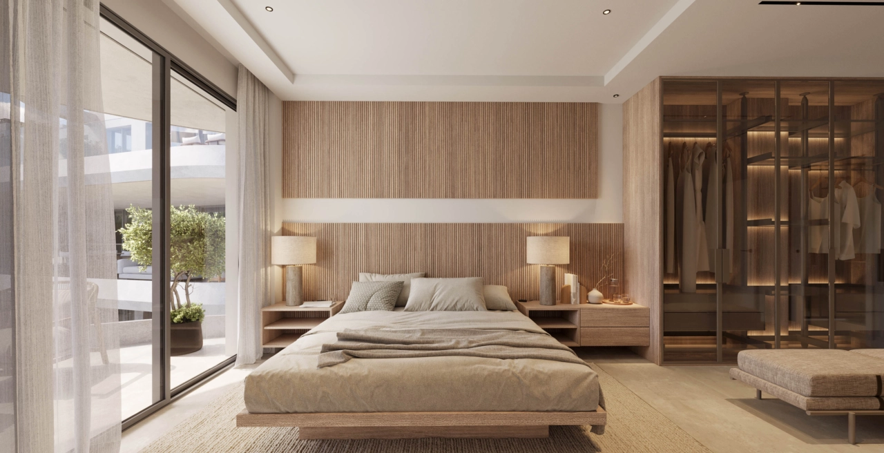 Das Hauptschlafzimmer bietet einen ruhigen Rückzugsort mit elegantem Design, großzügigem Kleiderschrank und direktem Zugang zu einer privaten Terrasse.