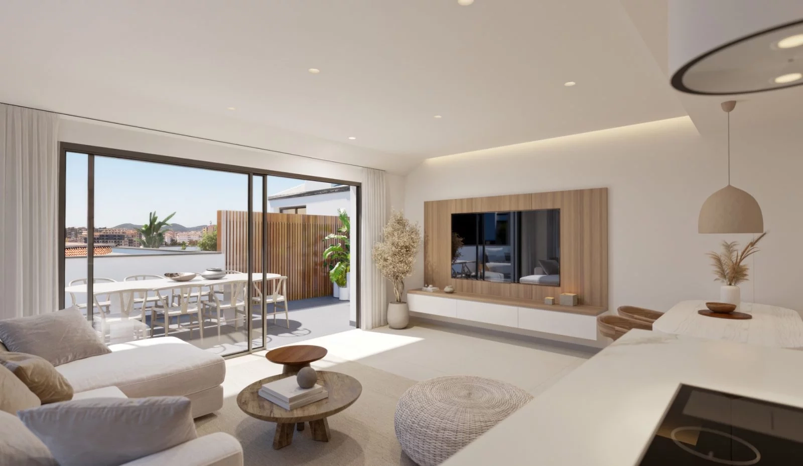 Offene Wohnbereiche, die nahtlos mit privaten Außenbereichen verbunden sind.